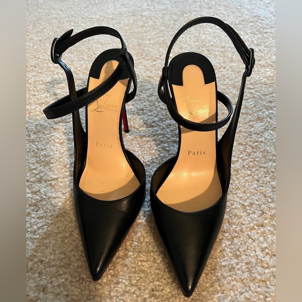 Louboutin red bottoms purchased from Paris